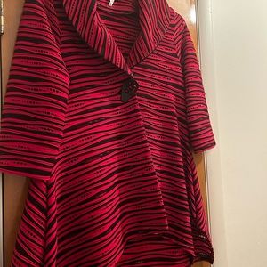 Red and black jacket with one big button down front